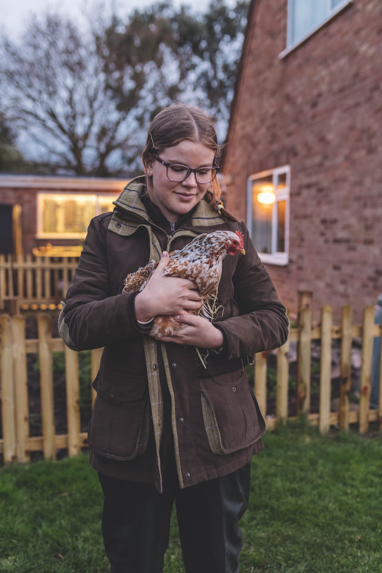 girl holding bantams
